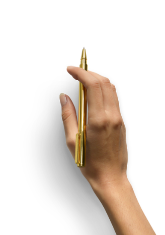 pen holding gold pen